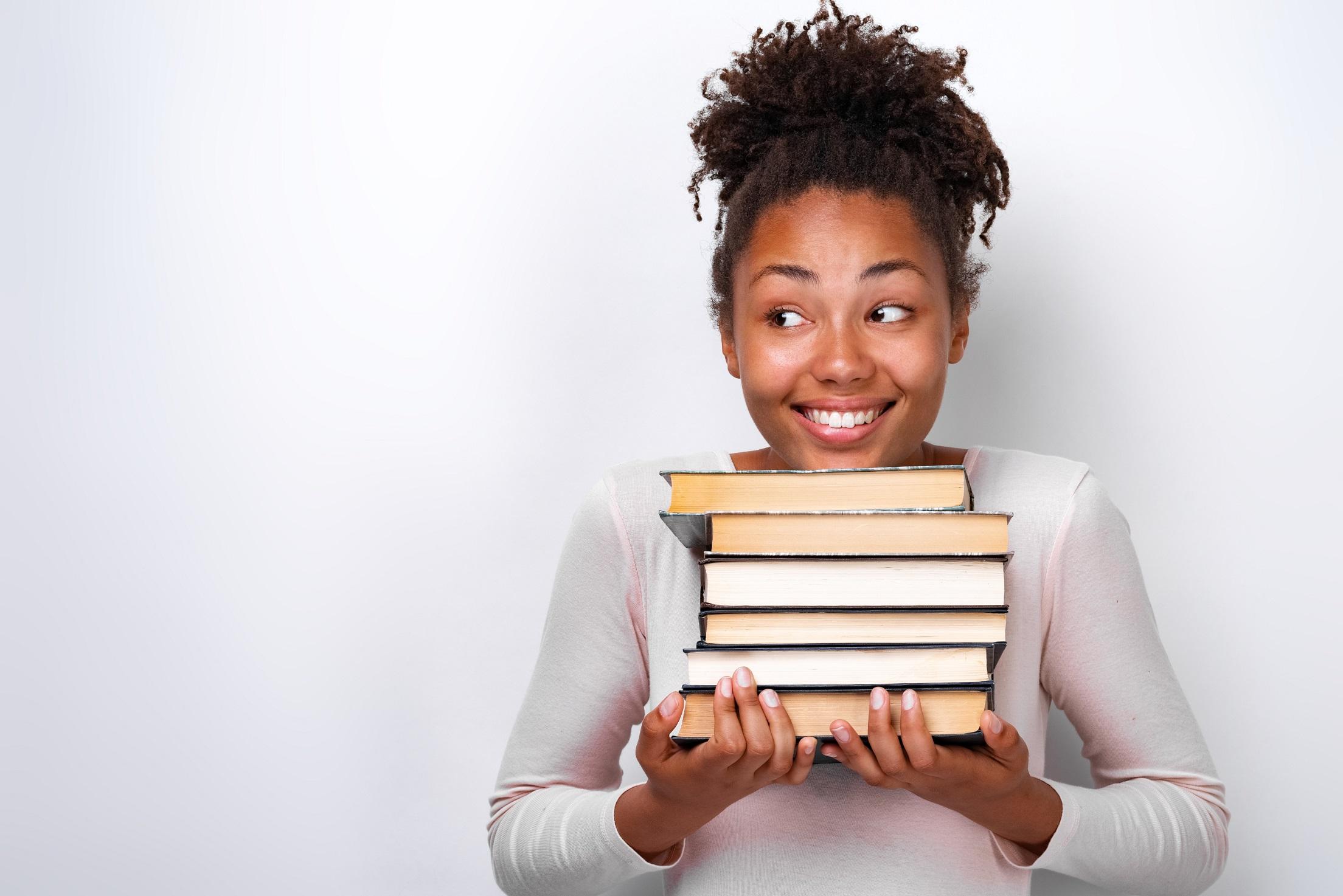 student-holding-books